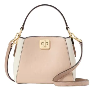 Beige and white handbag with a top handle and detachable shoulder strap, featuring a gold-tone turn-lock closure.