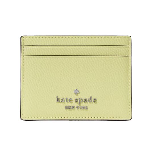 A light green Kate Spade cardholder with multiple slots and the brand's logo on the front.