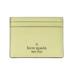A light green Kate Spade cardholder with multiple slots and the brand's logo on the front.