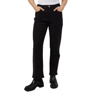 Black straight-leg jeans with a high-rise waist, featuring front and back pockets, and paired with chunky black ankle boots.