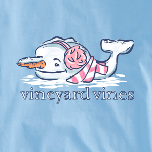 Blue graphic featuring a whale with a carrot nose, earmuffs, and a striped scarf, alongside the text \“vineyard vines.\“
