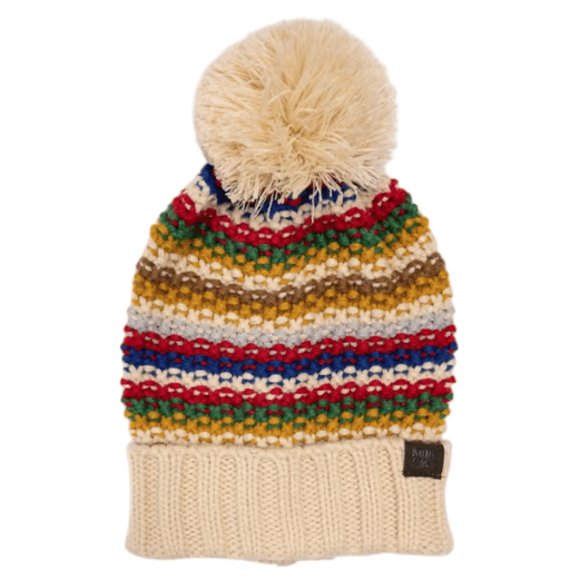 A colorful, striped knitted beanie with a large pom-pom on top, featuring a ribbed, cream-colored cuff and a metal tag label.