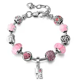 A charm bracelet featuring pink beads, floral designs, and a \“LOVE\“ pendant, with elements of silver and pink accents.