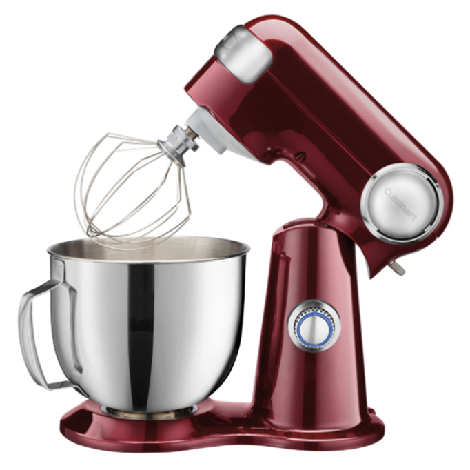 A red stand mixer with a stainless steel mixing bowl and wire whisk attachment.