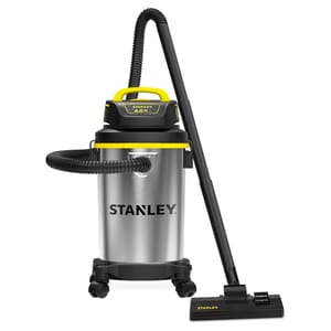 Stanley shop vacuum with stainless steel body, 4.0 horsepower motor, large attached hose, wheeled base for mobility, and black and yellow coloring.