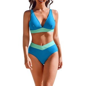 A two-piece bikini featuring a blue and mint-green color scheme with a V-neck top and high-waisted bottoms.
