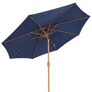 A blue patio umbrella with a wooden frame and a crank handle for adjusting height or angle.
