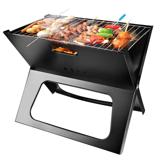 A portable rectangular charcoal grill with skewers of assorted meats and vegetables cooking on top.