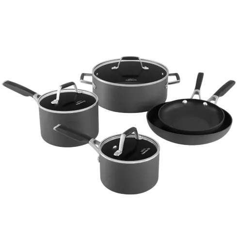 Cookware set including two saucepans with lids, a large pot with lid, and a frying pan, all in a sleek dark finish with metal handles.