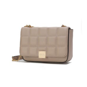 This is a rectangular, taupe shoulder bag with a quilted design, featuring gold-tone hardware and a branded front plaque.