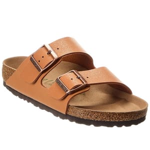 Birkenstock Arizona Birko-Flor Sandals feature two adjustable straps in a tan, leather-like material with metal buckles, a contoured cork footbed, and a black rubber outsole for comfort and support.