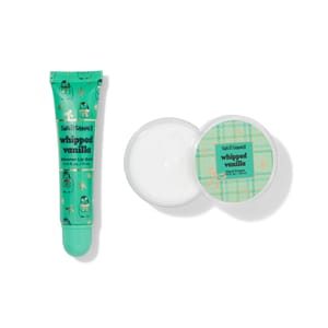 Sweet & Shimmer Whipped Vanilla Shimmer Lip Balm (0.41 fl oz/13 ml) and Hand Cream (1 fl oz/30 ml) in green packaging with holiday-themed designs.
