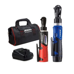 Cordless ratchet wrench set with red and blue wrenches, a black charging dock, and a branded carrying bag.