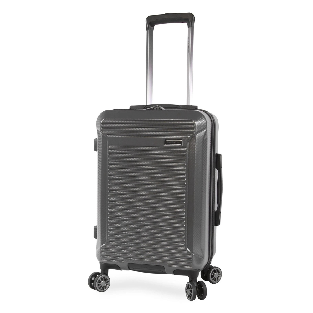 A grey hard-shell suitcase with four spinner wheels, telescopic handle, and textured exterior design.