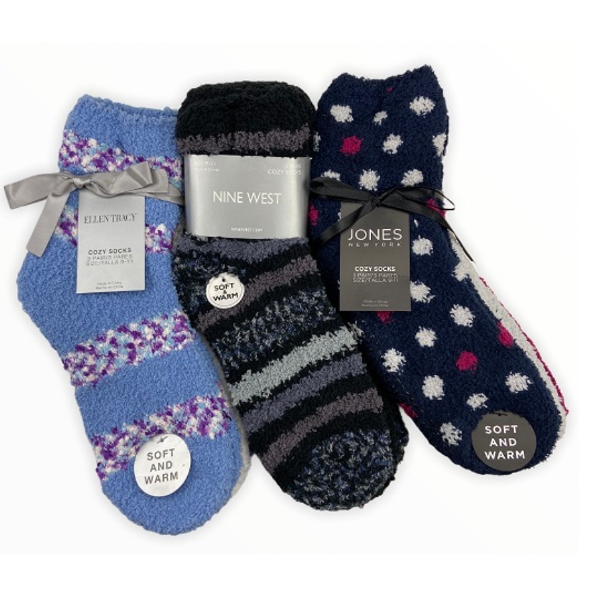 Three pairs of cozy winter socks in various patterns and colors, each with a branded tag from Ellen Tracy, Nine West, and Jones New York.