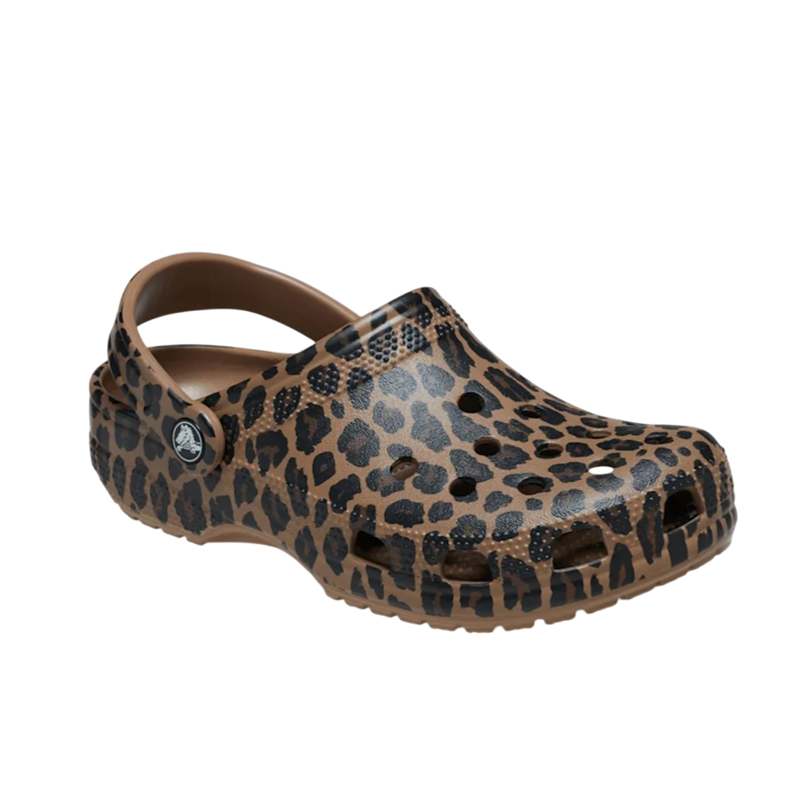 Leopard-print Crocs clog featuring ventilation holes, a pivoting heel strap, and a cushioned sole.