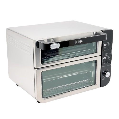 A Ninja stainless steel dual-compartment countertop oven with digital controls, featuring two stacked doors and a control panel on the side.