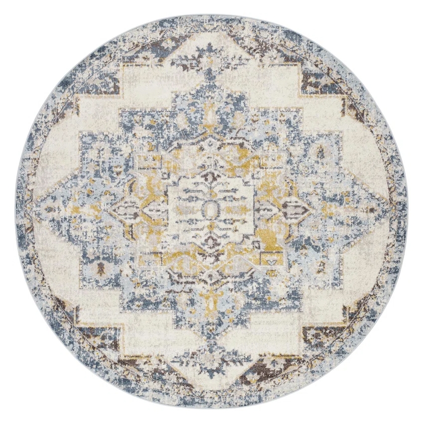 Round rug featuring a distressed medallion design in blue, yellow, and cream colors, measuring 7'10\“ in diameter.