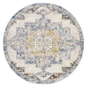 Round rug featuring a distressed medallion design in blue, yellow, and cream colors, measuring 7'10\“ in diameter.