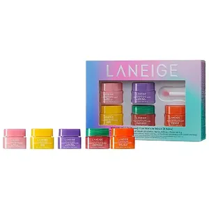 Five colorful jars of Laneige lip sleeping mask are arranged in front of their rainbow-themed packaging.