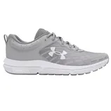 Gray Under Armour running shoe with a white logo on the side, featuring a mesh upper and \“Charged\“ cushioning sole.