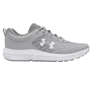 Gray Under Armour running shoe with a white logo on the side, featuring a mesh upper and \“Charged\“ cushioning sole.