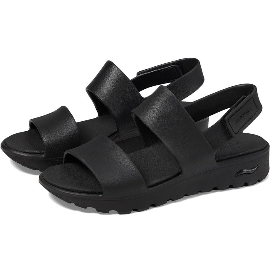 A pair of black platform sandals with multiple straps and a Velcro closure.