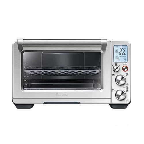 This is a Breville Smart Oven Air Fryer Pro, a stainless steel countertop appliance with digital display featuring dials and buttons for various cooking functions.