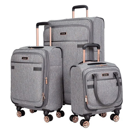 A set of three gray suitcases with wheels and telescoping handles, each one smaller than the next.