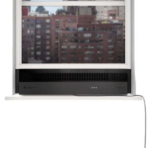 A black window air conditioner unit is installed in a window with a cityscape visible in the background.