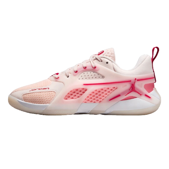 A pink and white Jordan sneaker with mesh panels, a translucent overlay, red accents, and the Jumpman logo on the side.
