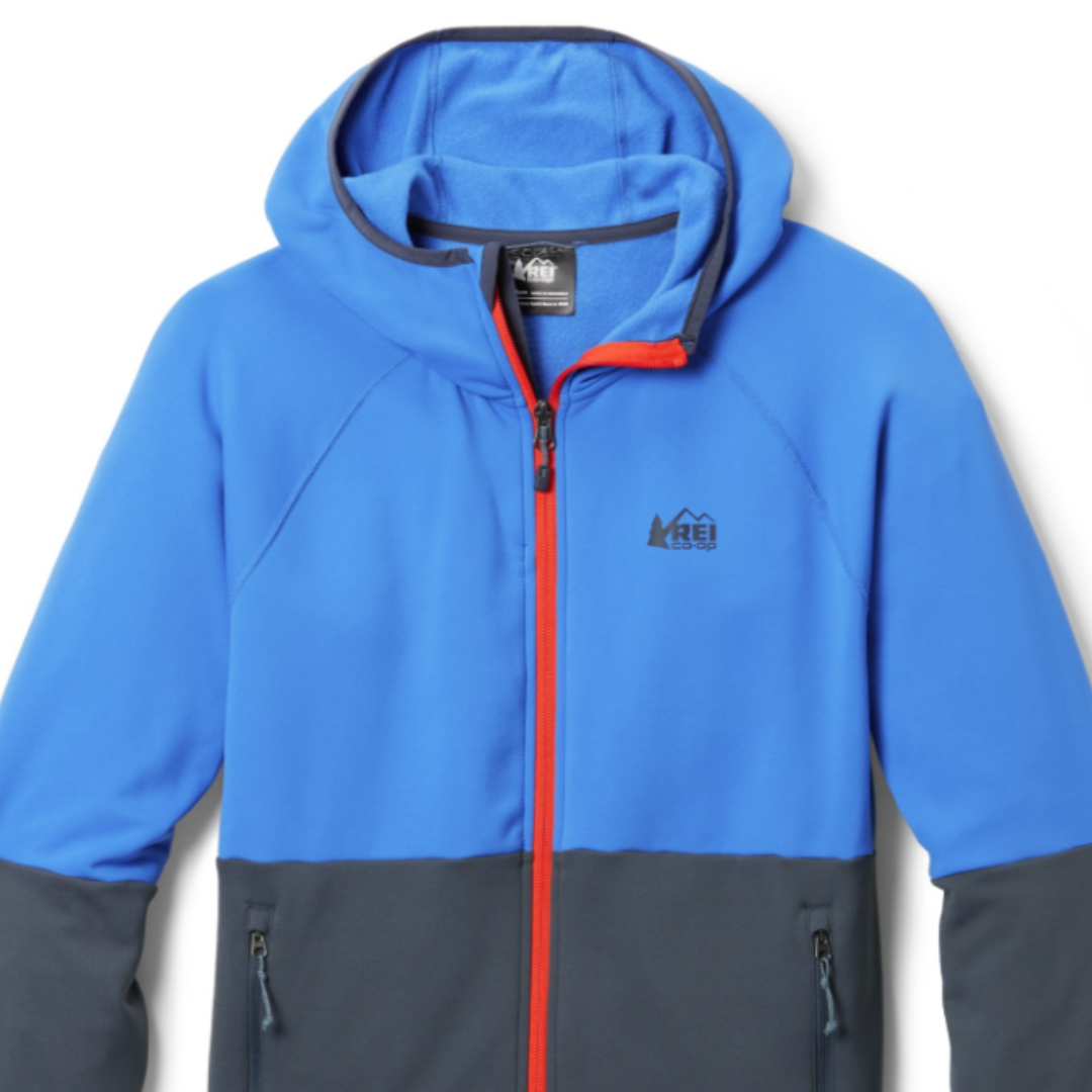 Blue and gray REI Co-op Flash Hyperstretch Fleece Jacket with a hood, featuring a red zipper and zippered pockets; the REI Co-op logo is displayed on the chest.
