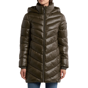 A long, olive-green puffer coat with a high collar and chevron quilting, worn over blue jeans.