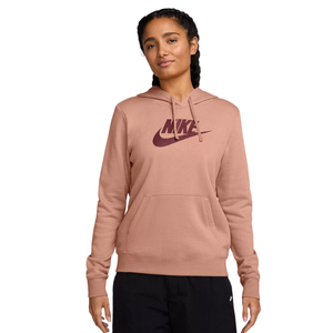 A person wears a brown Nike hoodie with a burgundy logo, paired with black pants.