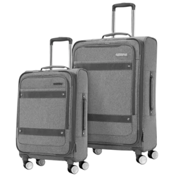 Two gray rolling suitcases with extendable handles and multi-directional wheels, varying in size for versatile travel needs.