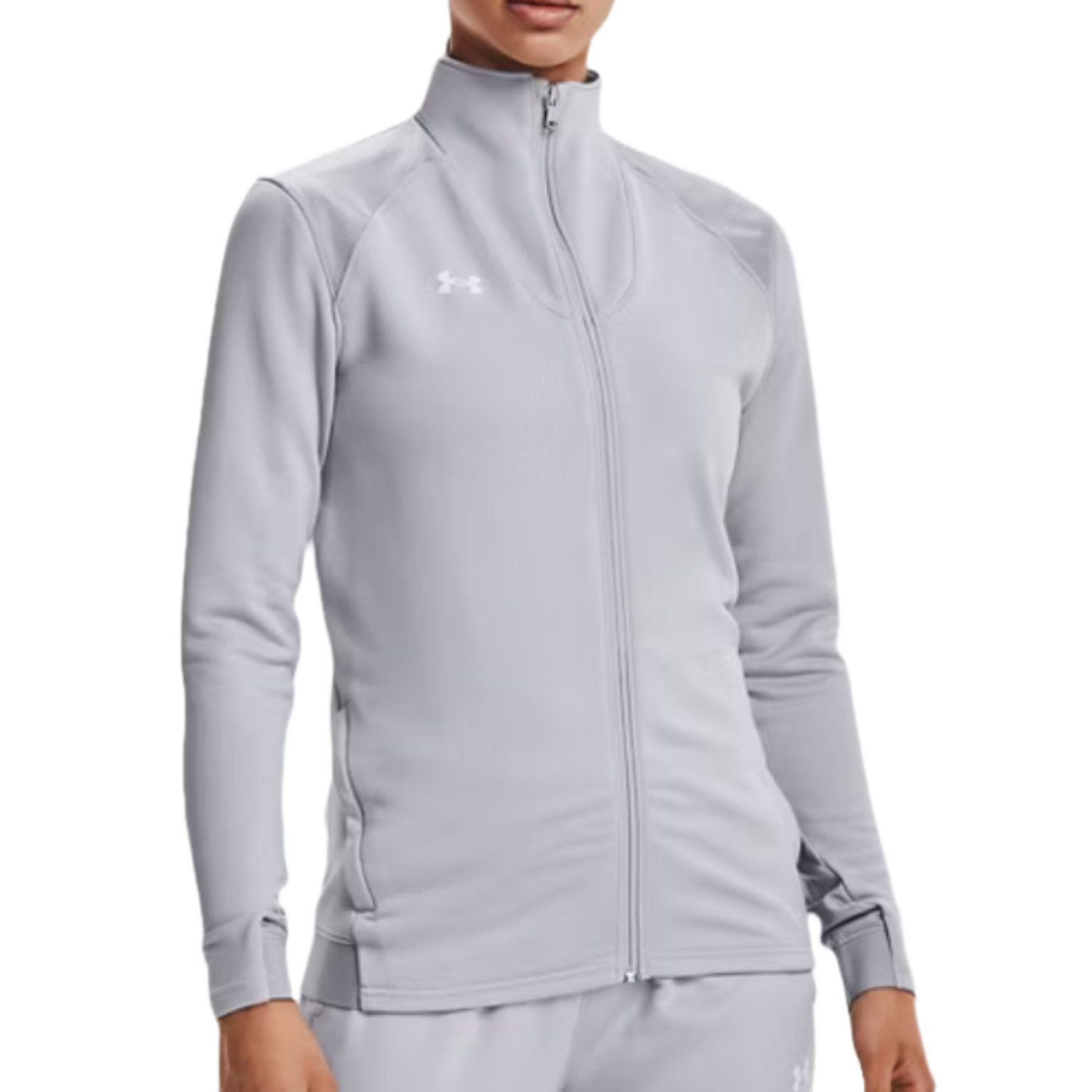 Light gray full-zip jacket with a high collar, featuring the Under Armour logo on the left chest. The jacket is paired with matching pants, creating a coordinated athletic warm-up set.