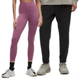 A pair of high-waisted purple leggings and a pair of black jogger pants, both worn with casual sneakers.