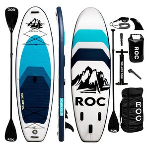 Inflatable stand-up paddleboard set with paddle, pump, ankle leash, fin, carry bag, and dry bag, featuring a mountain graphic design from ROC SUP Co.