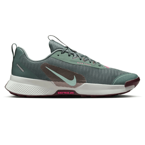 Nike Trail running shoe with a green mesh upper, white midsole, and maroon outsole, featuring a light blue Nike swoosh and \“Nike Trail ATC\“ branding in pink.