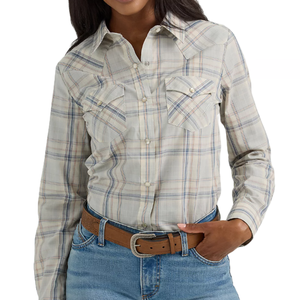 A plaid, long-sleeve Wrangler Western Snap Top with front snap buttons, flap pockets, and a classic collar. It's paired with blue jeans and a brown belt.