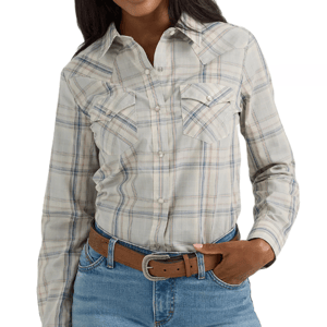 A plaid, long-sleeve Wrangler Western Snap Top with front snap buttons, flap pockets, and a classic collar. It's paired with blue jeans and a brown belt.