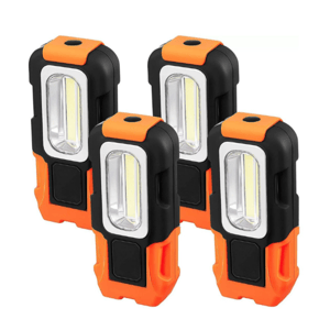 Four compact, rectangular LED work lights with black and orange casing, featuring a central light panel and a circular hole at the top for hanging or attaching.
