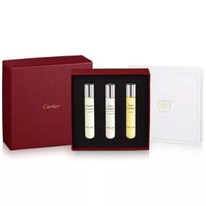 Cartier Men's Travel Spray Set includes three 0.33 oz bottles of fragrances: Pasha de Cartier, Pasha de Cartier Parfum, and Declaration. Presented in a red box with the Cartier logo.