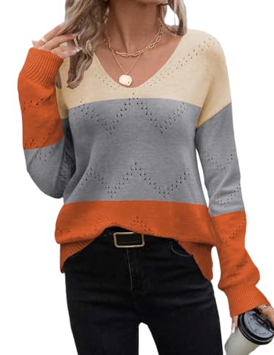 This is a women's V-neck sweater featuring color block design with beige, grey, and orange segments, and a patterned detail on the grey section.
