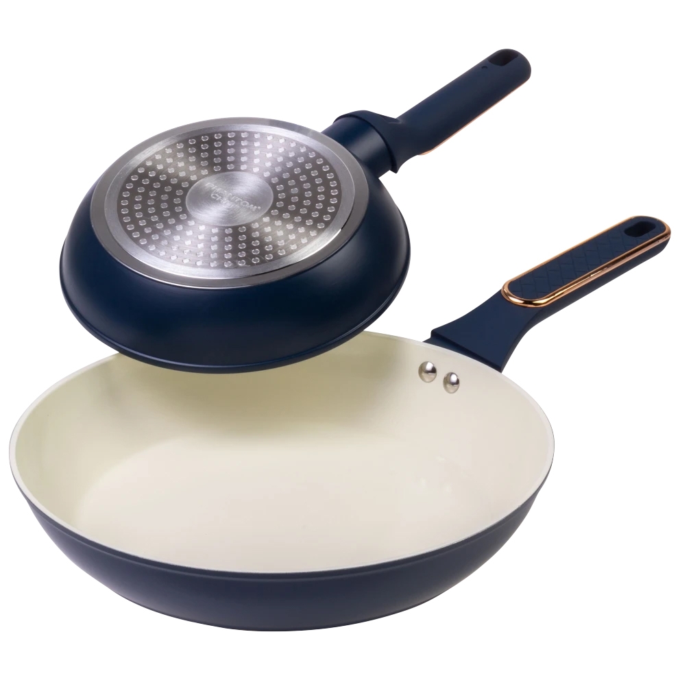 Two-piece nonstick cookware set featuring a deep fry pan with a lid and a shallow pan with a long handle, both in navy blue with cream interiors.