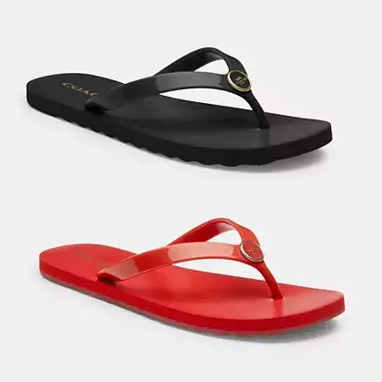 Black and red flip-flops with a strap thong design.