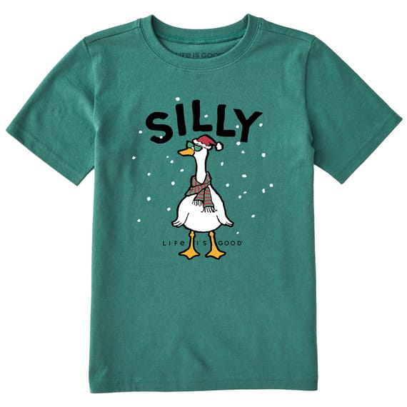 Green T-shirt featuring a cartoon goose wearing a winter hat and scarf, surrounded by snow, with the word \“SILLY\“ in large letters above and \“LIFE IS GOOD\“ below.