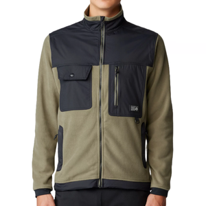 The Mountain Hardwear First Tracks Jacket features a dual-tone design with olive fleece and black upper panels, zippered and buttoned pockets, a full front zip, and a high collar.