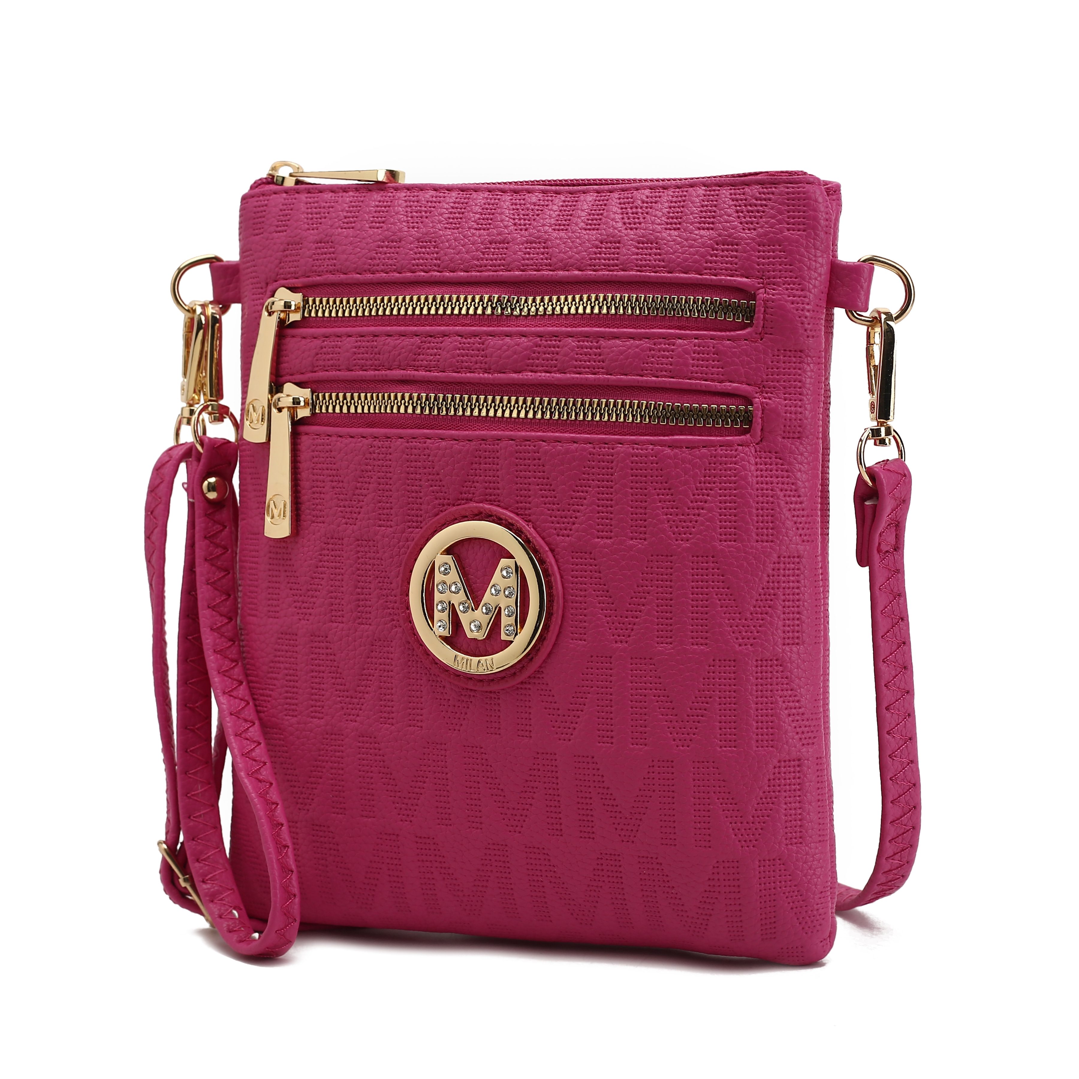 Pink crossbody bag with textured \“M\“ pattern, two front zippered pockets, and gold-tone hardware, including a circular emblem with rhinestones and braided strap.