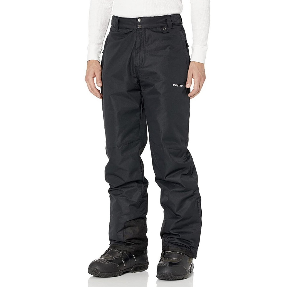 Black snow pants with a logo on the right thigh, worn with black winter boots.